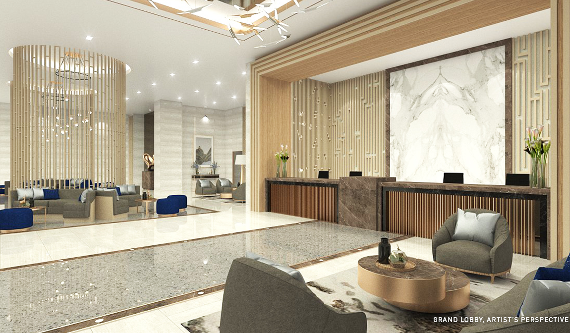 SMDC Glam Residences Lobby with a front desk and sofas with blue and white pillows