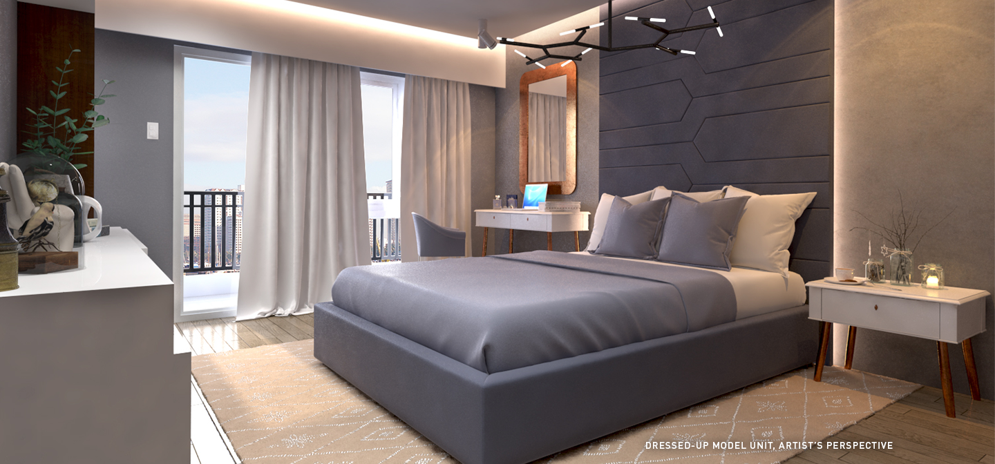 SMDC Sail Residences model units with a bed with gray sheets
