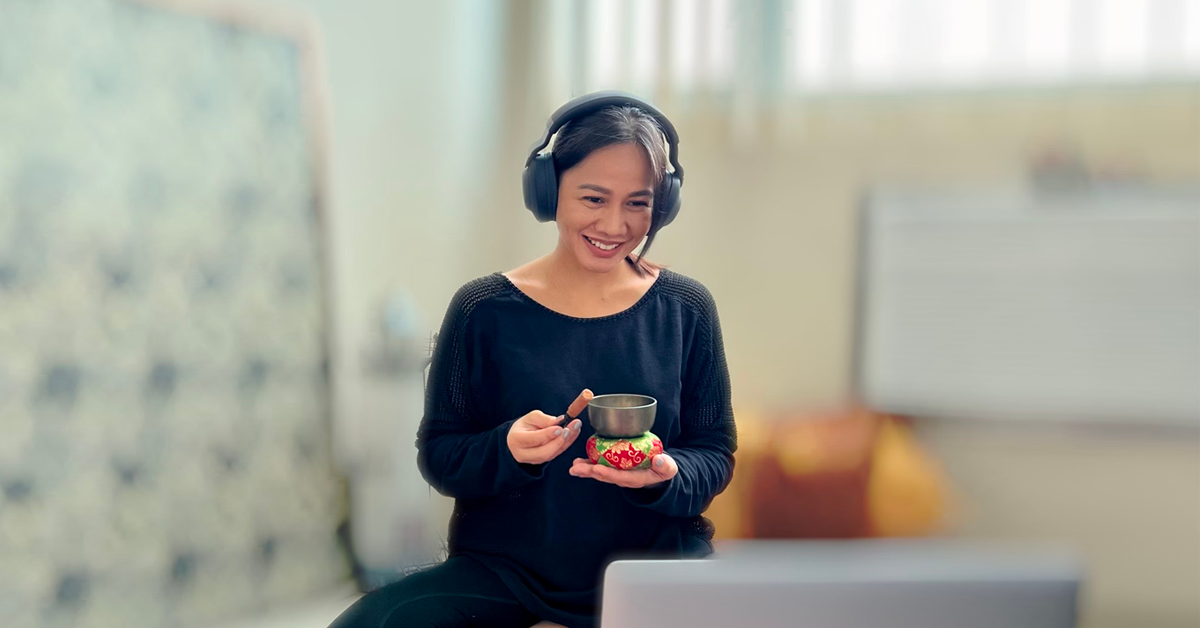 woman in black with headphones