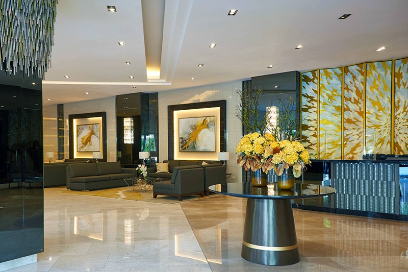 SMDC Fame Residences Lobby with yellow flowers